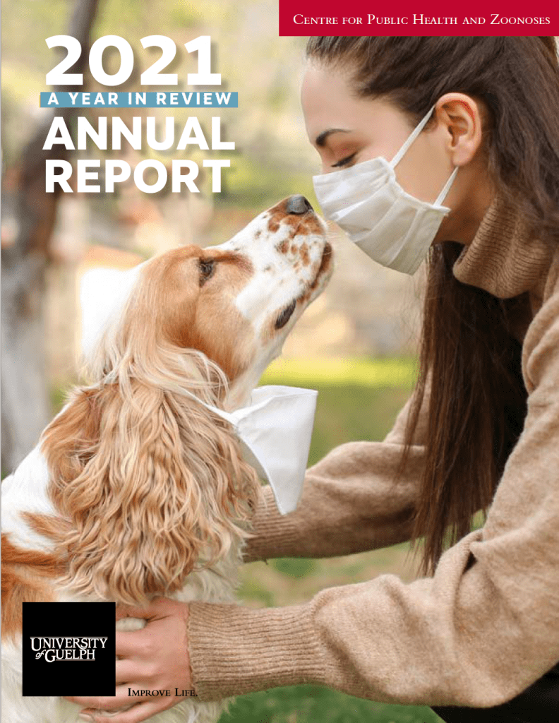 Cover page for the Center for Public Health and Zoonoses' 2021 "A Year in Review" Annual Report, containing a photo of a woman wearing a mask petting a dog, along with the University of Guelph logo on the bottom right with the slogan "Improve Life".